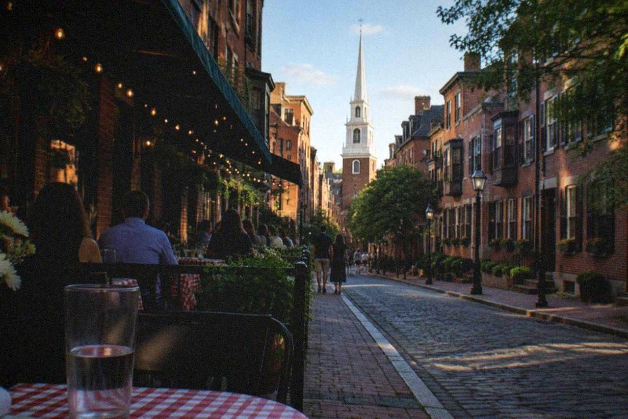 Hanover Street in Boston's North End lined with Italian restaurants and cafe awnings